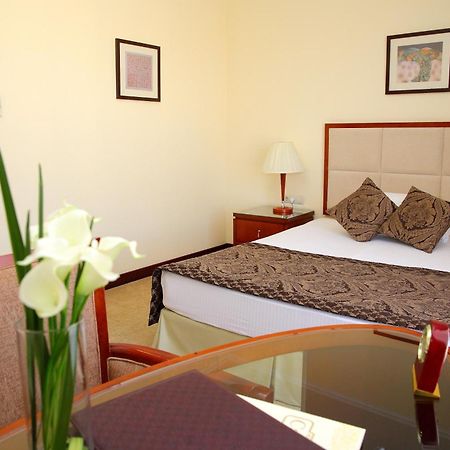 Park Hotel Bischkek Zimmer foto